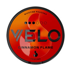 VELO Cinnamon Flame Slim 10mg nicotine pouches featuring bold red and orange packaging with a heating effect design and a strength level of 3 out of 6 dots. Delivers a warm and spicy cinnamon flavour for an intense and invigorating nicotine experience.