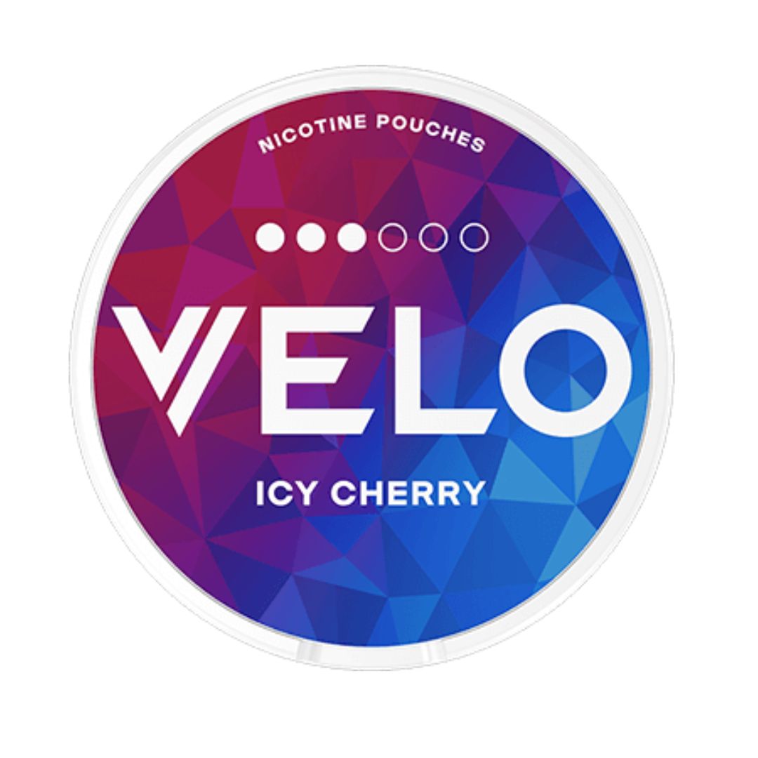 VELO Icy Cherry Slim 10mg nicotine pouches featuring vibrant blue and cherry red geometric packaging with a strength level of 3 out of 6 dots. Delivers a refreshing fusion of icy coolness and rich cherry flavour for a smooth and invigorating nicotine experience.