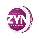 ZYN Black Cherry Mini Dry 6mg nicotine pouches featuring rich purple and white packaging with a strength level of 4 out of 4 dots. Offers a bold and sweet black cherry flavour for a discreet and satisfying nicotine experience.