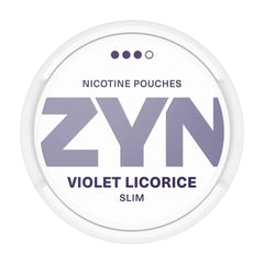 ZYN Violet Licorice Slim 11mg nicotine pouches, featuring striking purple and white packaging with a 4-dot strength level. Slim, tobacco-free format delivering a bold liquorice flavour with a strong nicotine experience.