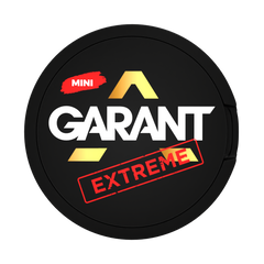 Round black label with 'MINI Garant Extreme' text on a white background