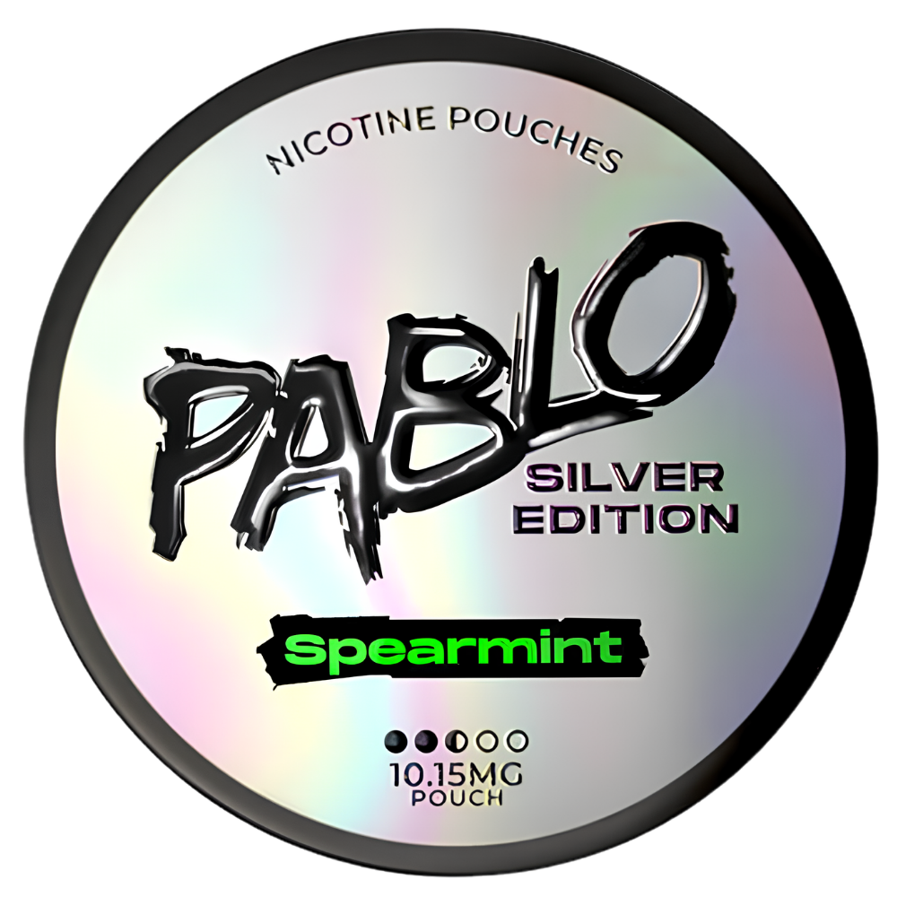A round silver holographic nicotine pouch can labeled 'PABLO SILVER EDITION' and 'Spearmint' on a plain white background.