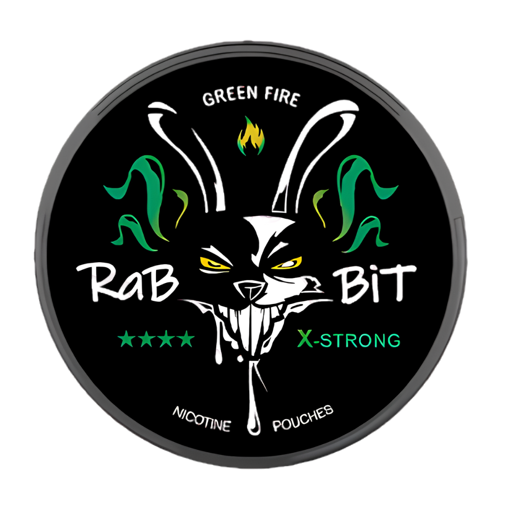 A round black nicotine pouch can with a dark gray rim, featuring a stylized white rabbit face with yellow eyes, green smoke graphics, and the text 'GREEN FIRE', 'RABBIT BIT', 'X-STRONG', and 'NICOTINE POUCHES' on a white background.