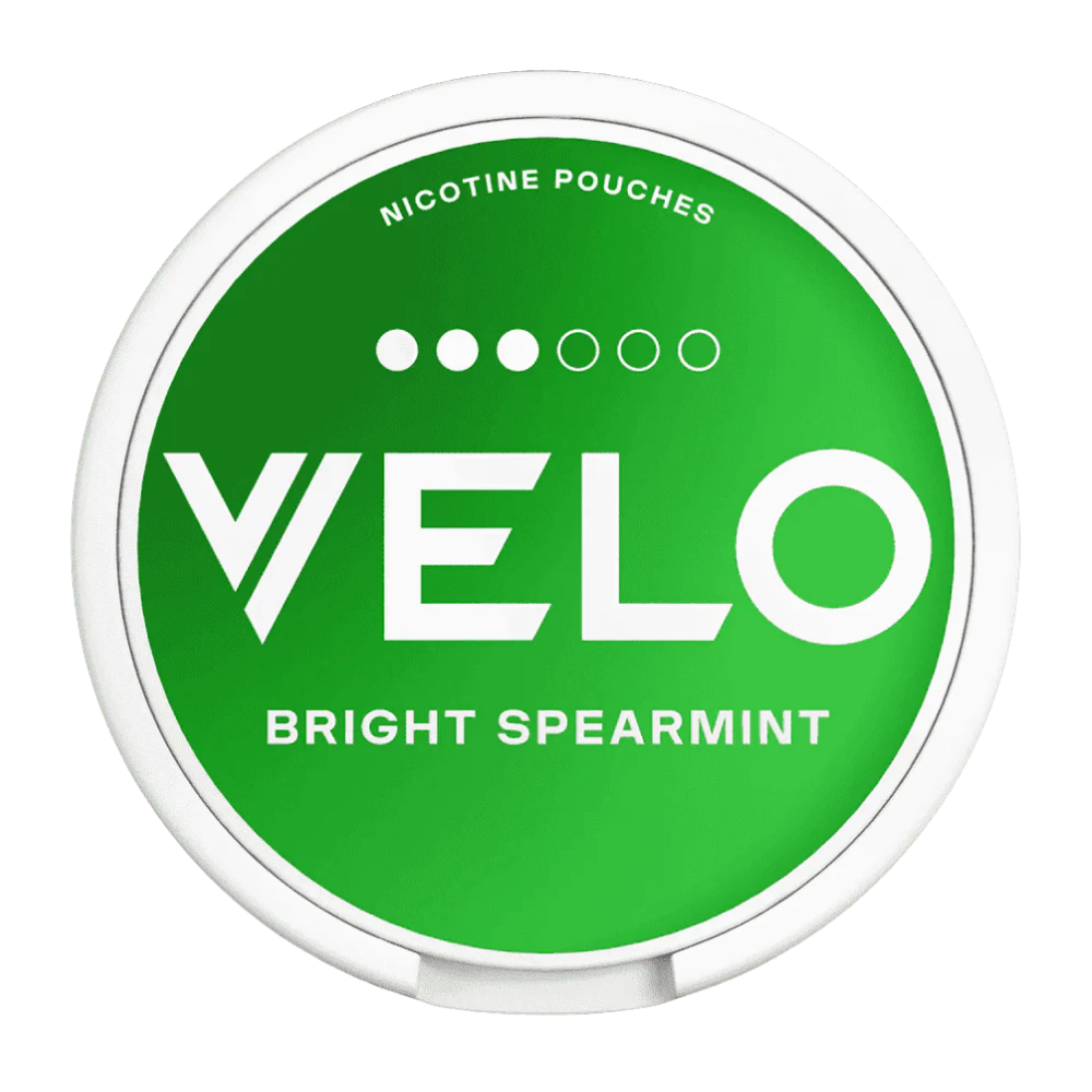 Green container of Velo nicotine pouches with 'Bright Spearmint' flavor on a white background