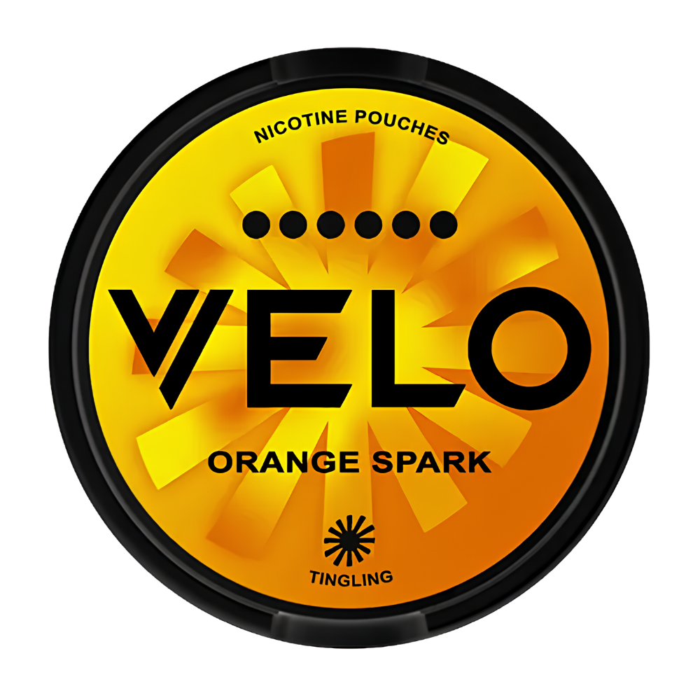 A round black container of Velo Orange Spark nicotine pouches by Tingling, featuring a vibrant orange and yellow sunburst design with bold black text.