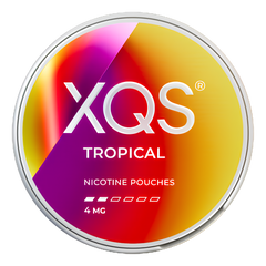 A round tin of XQS Tropical Nicotine Pouches 4 MG, featuring a vibrant diagonal gradient label with red, orange, yellow, and purple tones and a silver metallic rim.